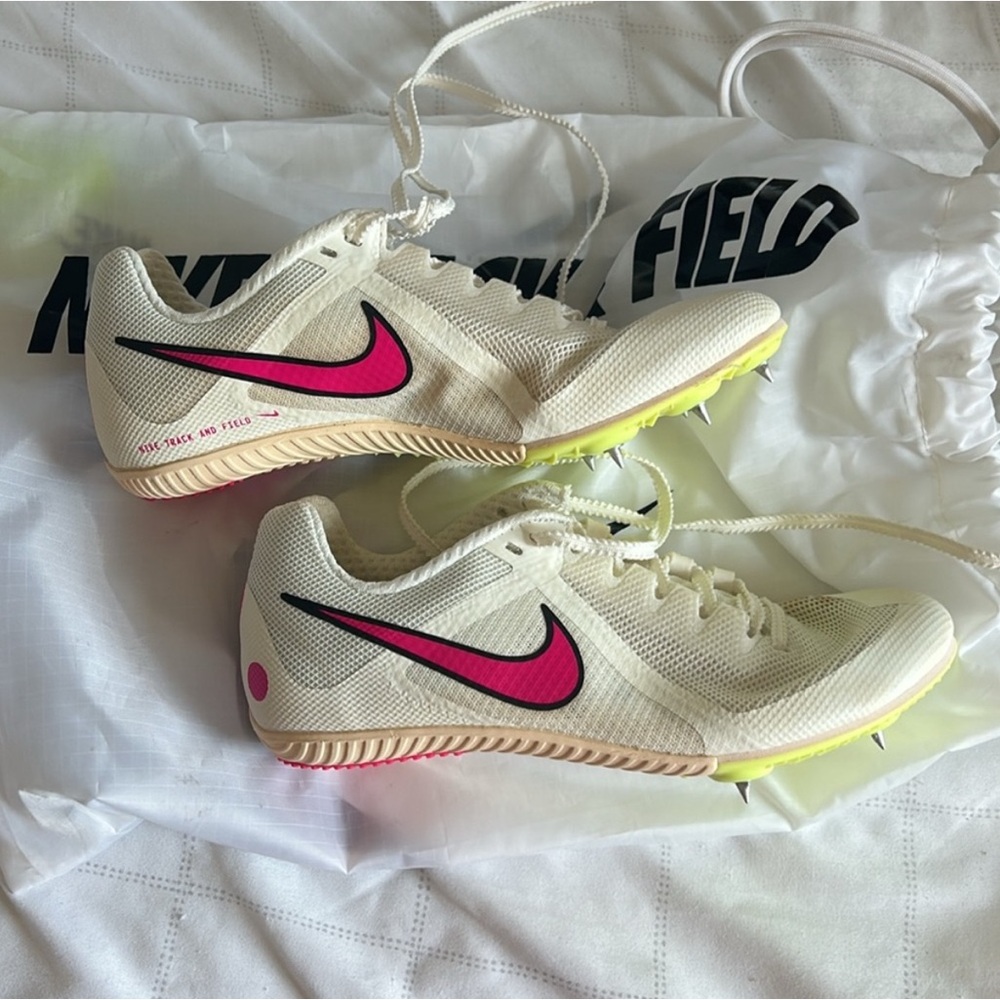 Nike White and Pink Athletic Shoes for Performance